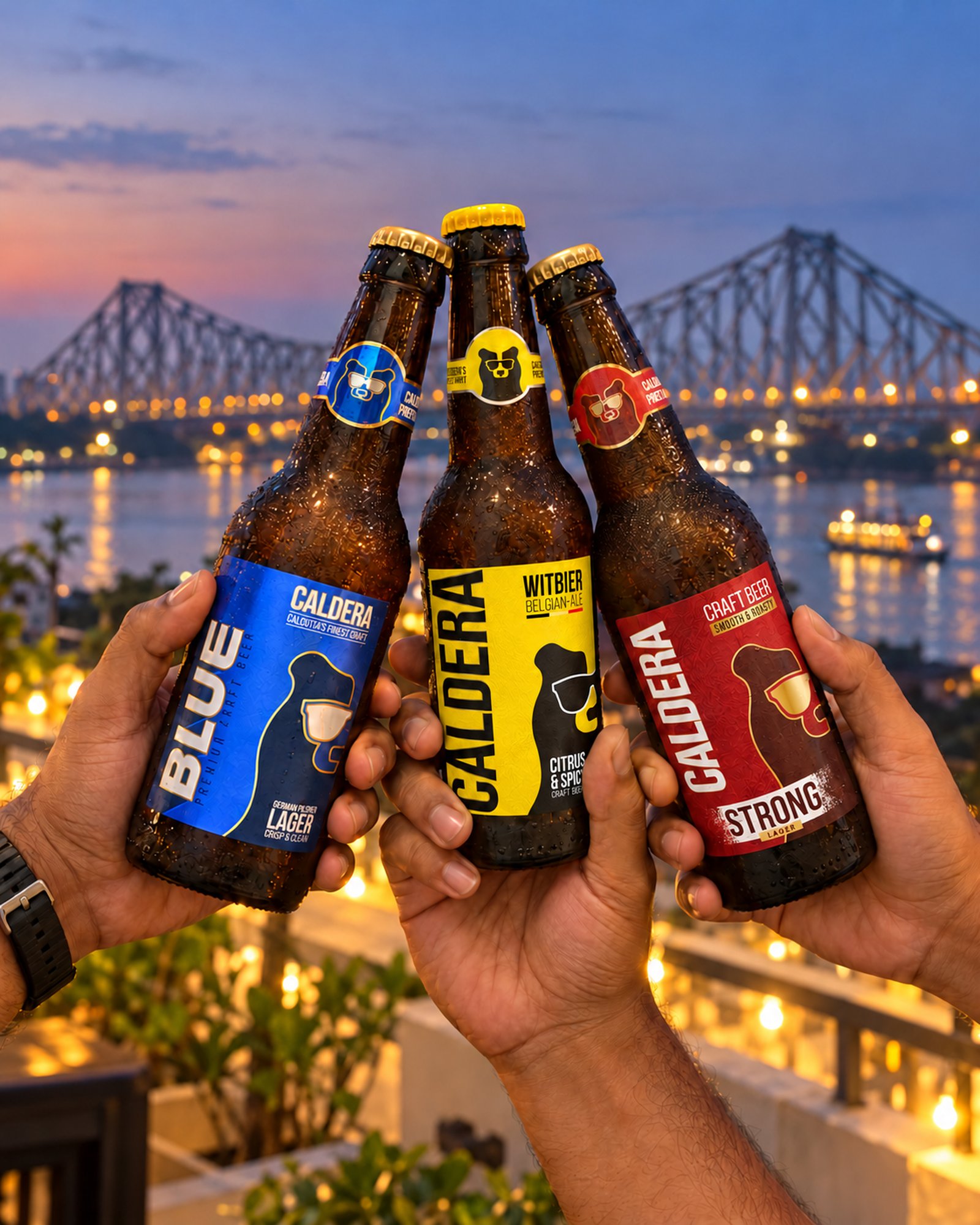 Friends toasting with Caldera, Howrah Bridge and the Hooghly at twilight behind